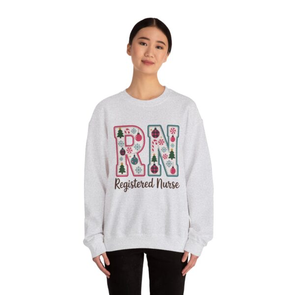 1342378537518879931_2048.jpeg Registered Nurse (RN) Christmas Sweatshirt