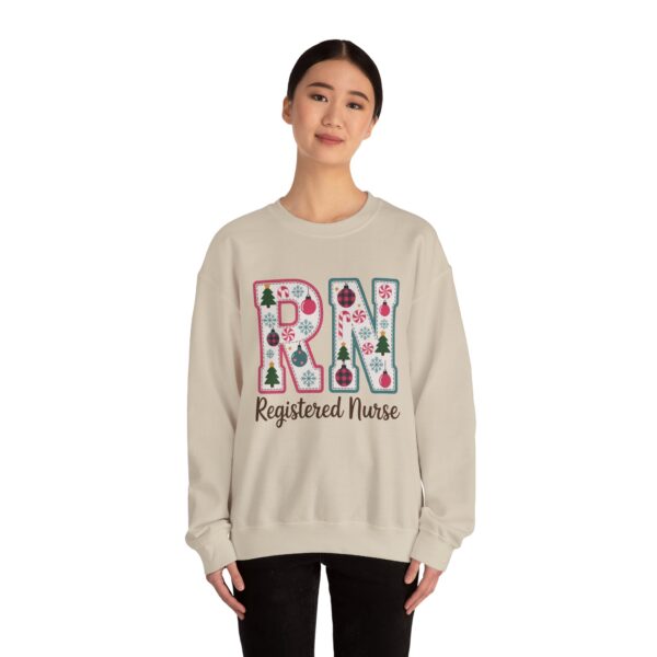 479863403945478115_2048.jpeg Registered Nurse (RN) Christmas Sweatshirt