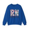 6990678212612413642_2048.jpeg Registered Nurse (RN) Christmas Sweatshirt